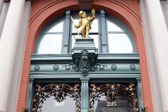 17-3 Entrance To The Puck Building 295-307 Lafayette St With Gilded Statue Of Puck In Nolita New York City.jpg